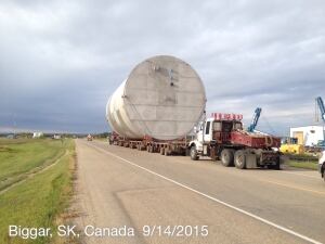 SaskPower moving big cylinder along highway