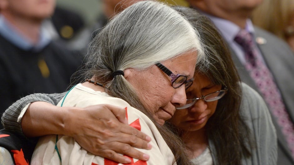 Residential school survivor Lorna Standingready is comforted by a fellow survivor in the audience during the closing ceremony of the Indian Residential Schools Truth and Reconciliation Commission, at Rideau Hall, June 3, 2015.