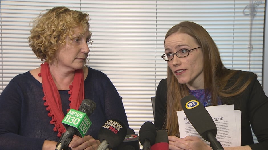 UBC VP of Equity and Inclusion, Sara-Jane Finlay, listens to former student Glynnis Kirchmeier, right, at a press conference on Nov. 22 where Kirchmeier announced she will file a complaint with the BC Human Rights Tribunal over the school's treatment of people reporting sexual misconduct.