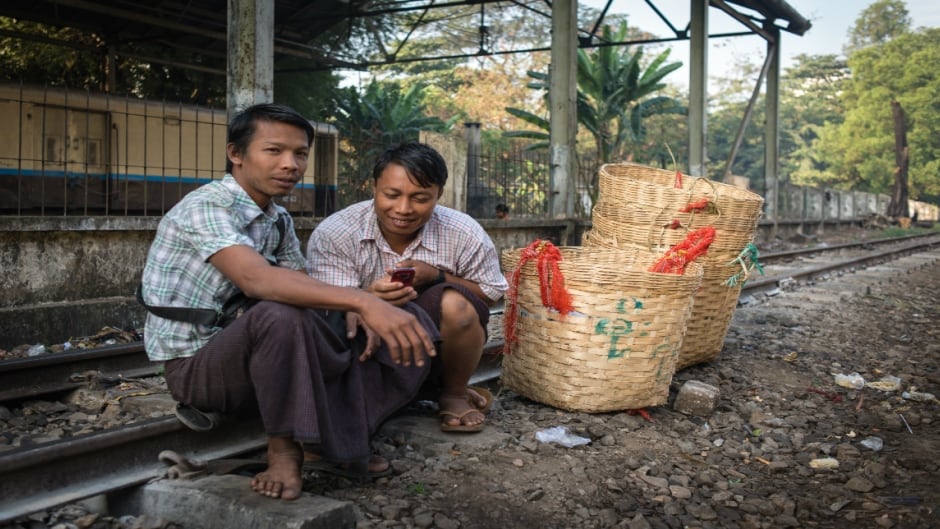 Basket salesmen in Rangoon, Burma.