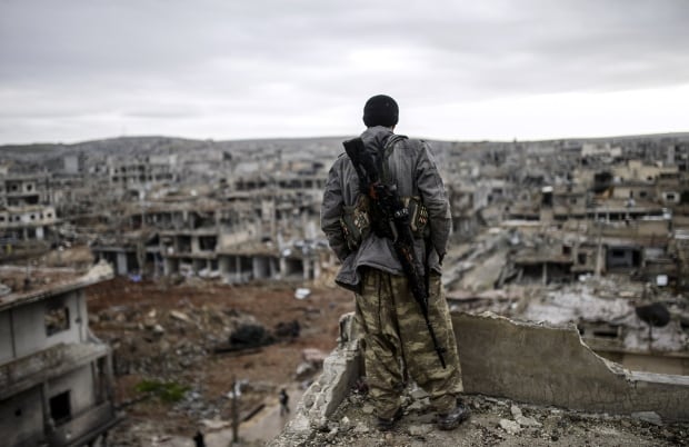 2015 photos of the year siege of kobane Jan 30 rooftop sniper