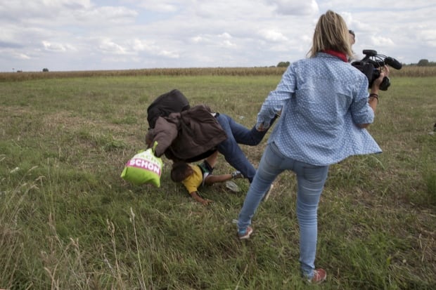 2015 photos of the year Hungarian journalist Petra Laszlo kicks migrants Sept 8