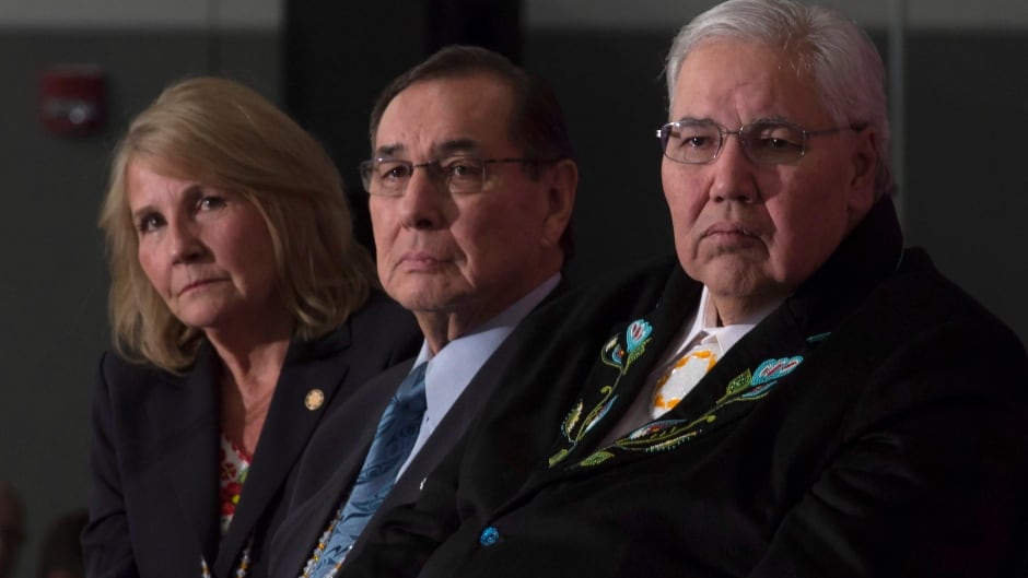 Commissioner Justice Murray Sinclair, Commissioner Chief Wilton Littlechild and Commissioner Marie Wilson (right to left) listen to a speaker as the final report of the Truth and Reconciliation commission is released, Dec. 15, 2015 in Ottawa.