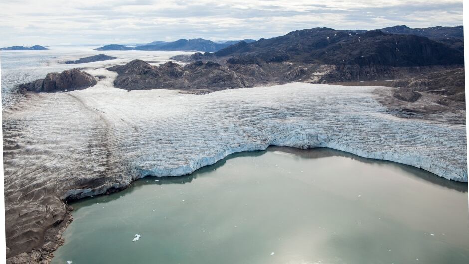 The Upernavik Glacier in northwest Greenland is melting into a lake. Greenland's ice sheet has been melting twice as fast during the 21st century as it did during the 20th.