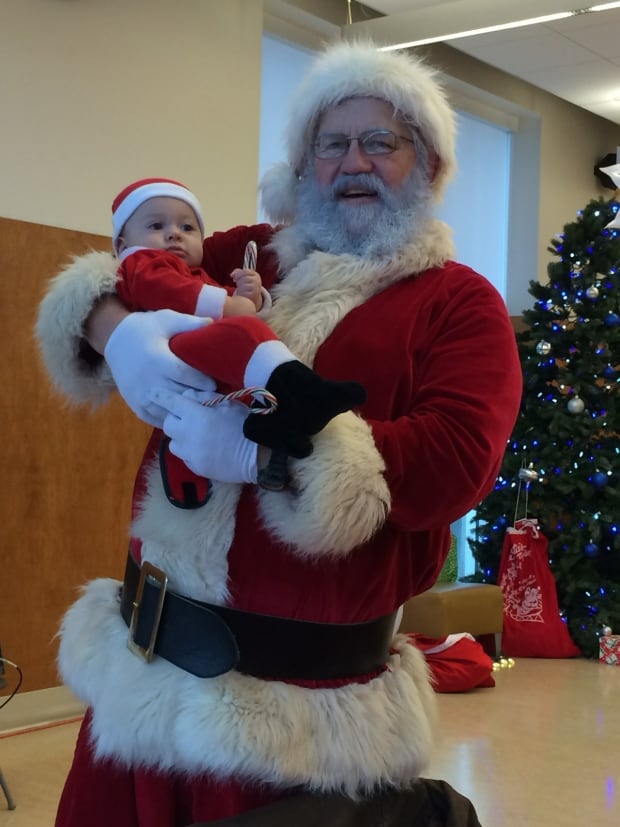 Dick Woldring, aka Santa and mini Santa and candy canes