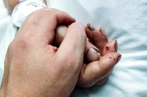 Pat Kane holding his dad's hand