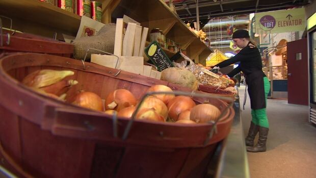 Desinee Ralph selling produce at The Forks in Winnipeg