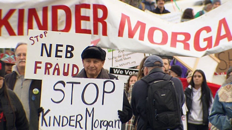Grand Chief Stewart Phillip of the Union of B.C. Indian Chiefs leads a protest against expansion of the Kinder Morgan Trans Mountain pipeline on Jan. 19, while National Energy Board hearings continue in Burnaby.