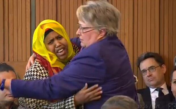 Woman comforted