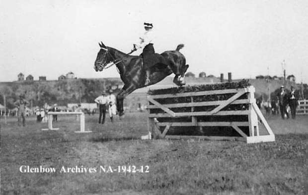 Horse jumping in Calgary, 1900