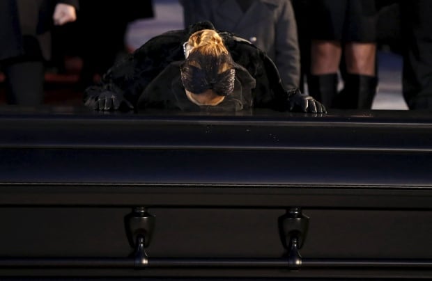 WIP Celine Dion kisses casket of husband Rene Angelil Jan 22 2016
