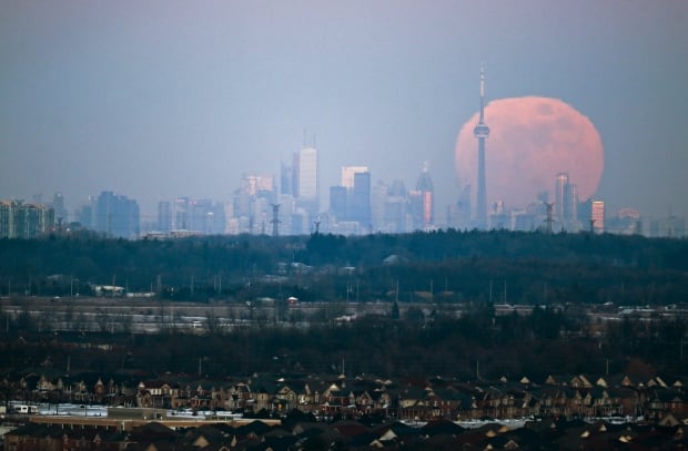 WIP moonrise over Toronto from Milton Ont Jan 23 2016