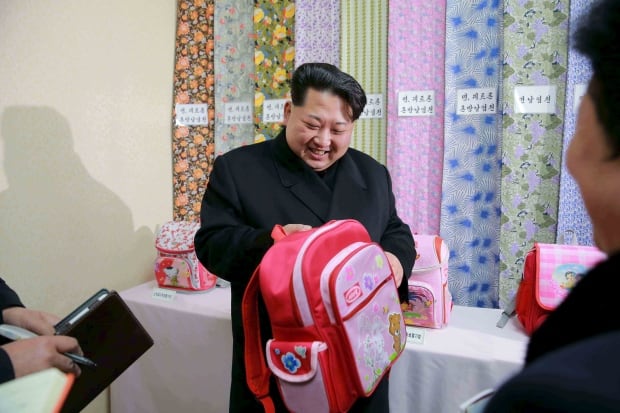 WIP NORTH KOREA-Kim Jong Un looks at back packs Jan 28 2016