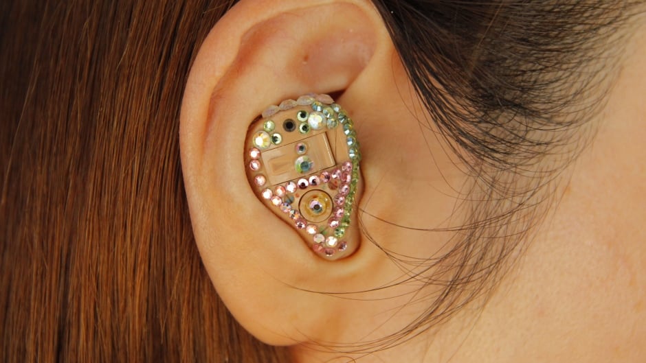 Why are glasses cool, but not hearing aids like this one, decorated with crystals?