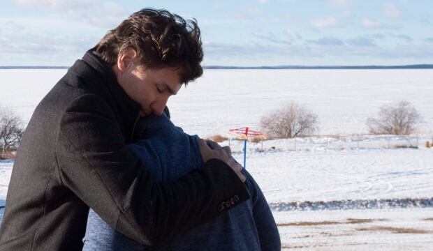WIP PM Trudeau hugs Phyllis Longobardi in La Loche Sask Jan 29 2016