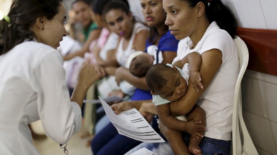 Mothers with their children, who have microcephaly, await medical care at the Hospital Oswaldo Cruz, in Recife, Brazil, January 26, 2016. Health authorities in the Brazilian state at the center of a rapidly spreading Zika outbreak have been overwhelmed by the alarming surge in cases of babies born with microcephaly, a neurological disorder associated to the mosquito-borne virus.