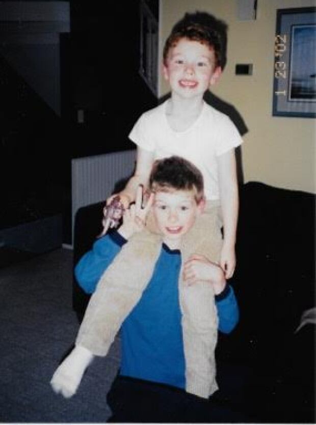Jason on Ryan Pinneo's shoulder's
