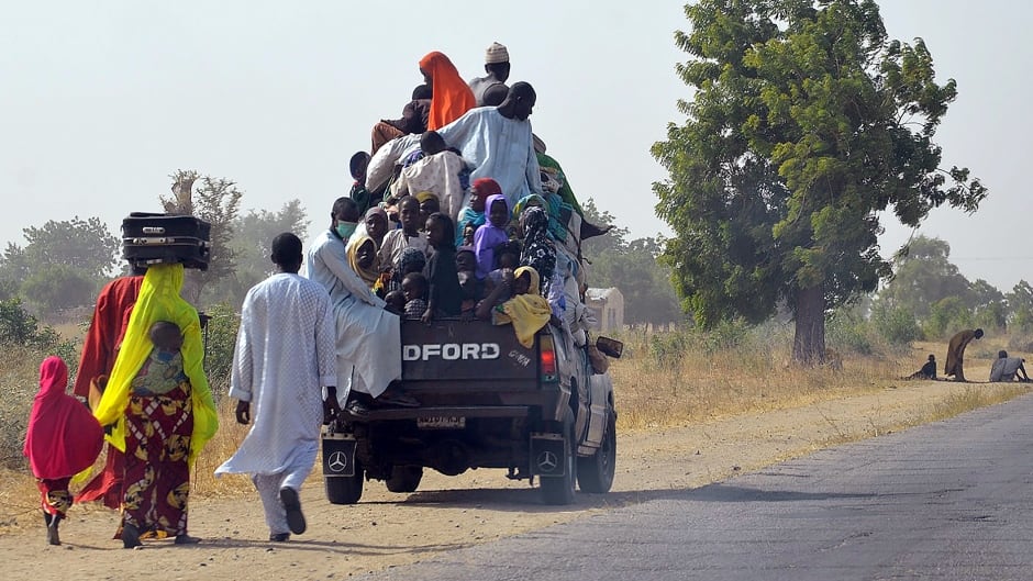 A loaded truck wait to carry people fleeing from Boko Haram Islamists at Mairi village outskirts of Maiduguri capital of northeast Borno State, on Feb. 6, 2016.