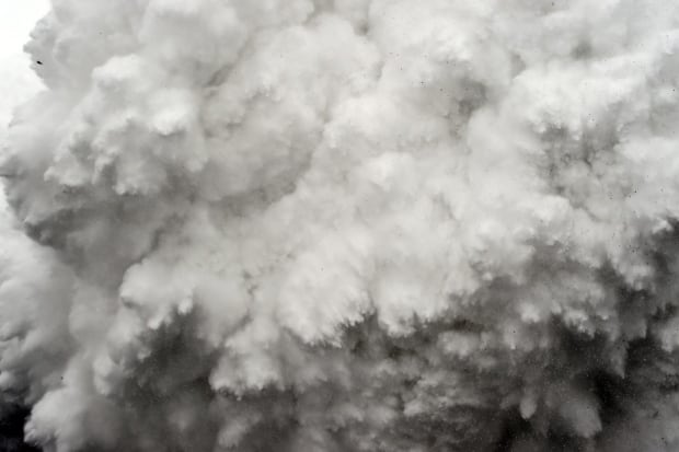 World Press Photo 2016 2nd prize spot news Everest avalanche by Roberto Schmidt