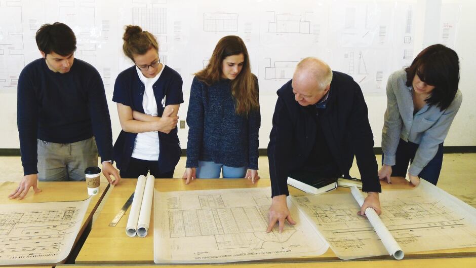 Waterloo Architecture students Alexandru Vilcu, Siobhan Allman, Anna Longrigg, and Piper Bernbaum review the Auschwitz Crematorium evidence plans with Waterloo Architecture Professor and The Evidence Room Co-Principal Robert Jan van Pelt.