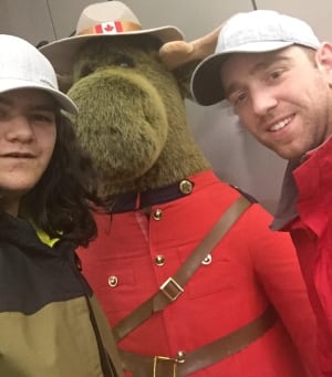 Cyrus Nuna, RCMP Cst. Dan Sharpe, and a Mountie moose