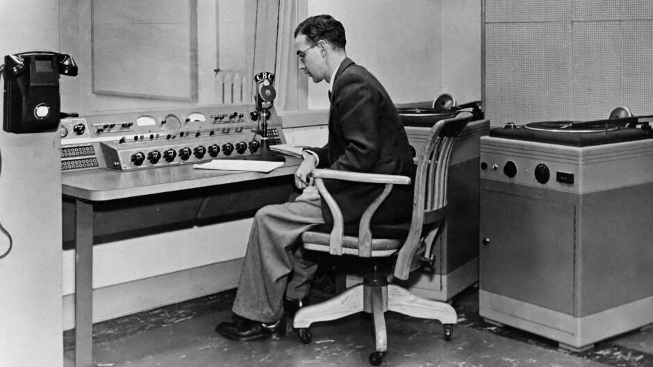 Barry MacDonald, the first station manager of CBC's Sydney bureau, in the control room of the station on the day it opened on Nov. 1, 1948.