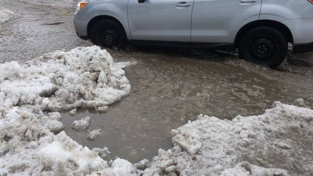 Rain Ottawa winter storm slush wet streets roads Feb 25 2016