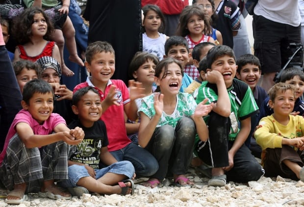 Mideast Lebanon Syria Clown Therapy