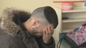 Syrian father at dentist
