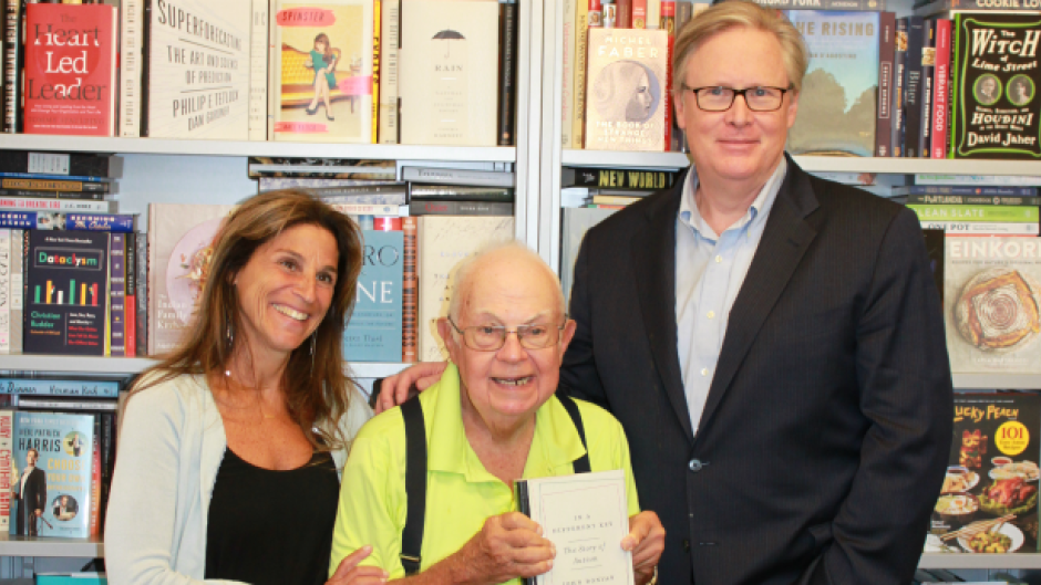 Donald Triplett (centre) now 83 years old, was the first child diagnosed with autism, with Caren Zucker and John Donvan, authors of "In a Different Key: The Story of Autism."