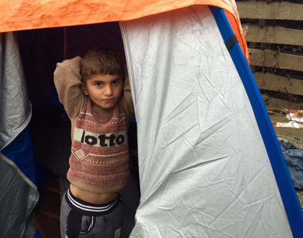 Little boy in tent