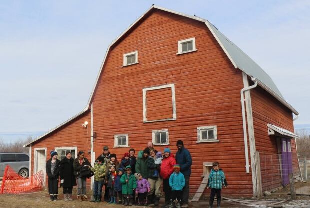 Barn shot, families supporting Michelle McHale