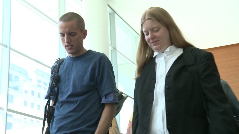 Iraq war resister Jeremy Hinzman with immigration lawyer Alyssa Manning in Toronto