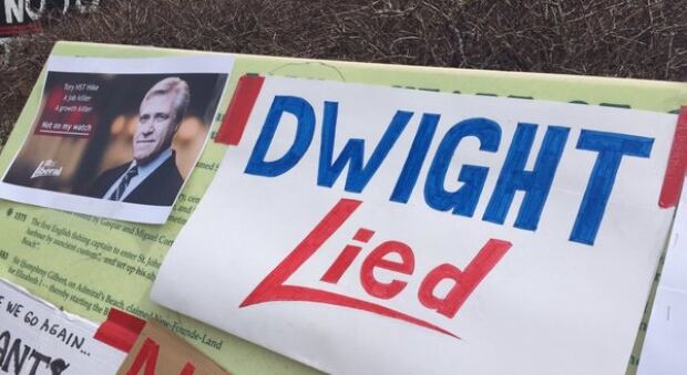 Dwight Ball lied protest sign