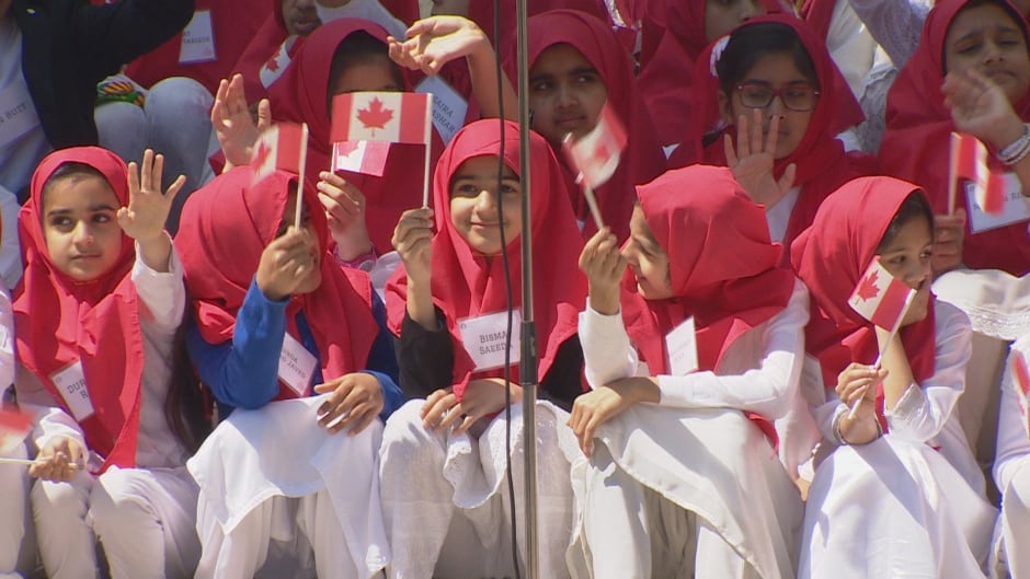Young Ahmadiyya Muslims attend celebrations of their faith's arrival in Canada, in Toronto on May 7, 2016.