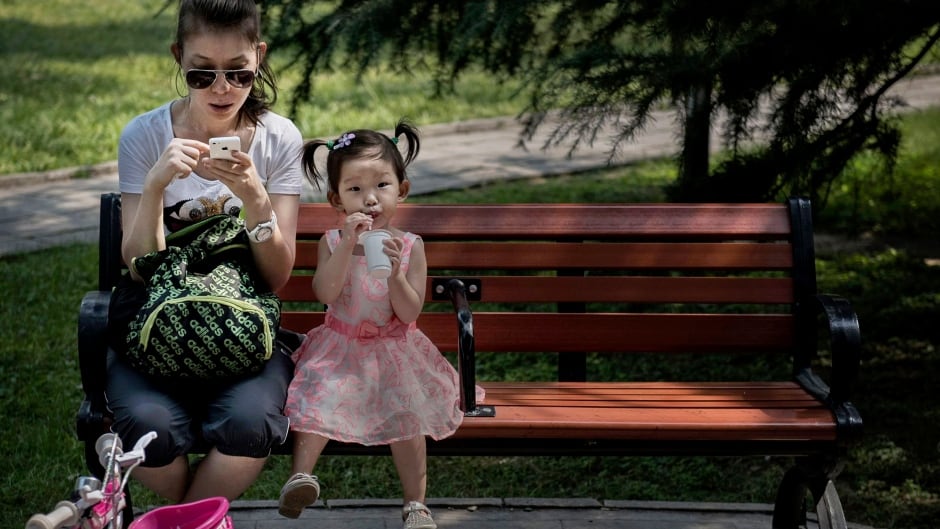 Two recent studies argue that being tethered to our smartphones is having a negative effect on parenting.