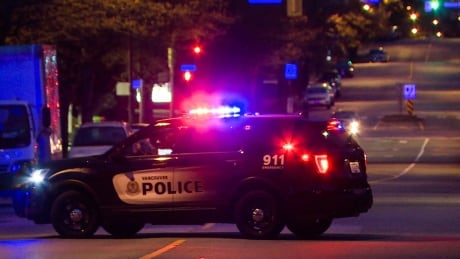 Stock Image - VPD, Vancouver Police Department, Officer, Cruiser, Car, Crime Scene VPD Vancouver Police Department Cruises Lights Crime Scene
