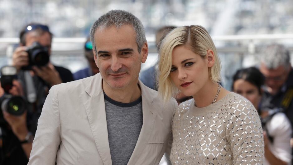 Director Olivier Assayas, left and actress Kristen Stewart, pose for photographers during a photo call for the film Personal Shopper at the 69th international film festival, Cannes, southern France, Tuesday, May 17, 2016.
