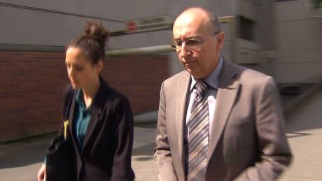 Former B.C. government communications director Brian Bonney leaves Vancouver provincial court Tuesday morning. Brian Bonney