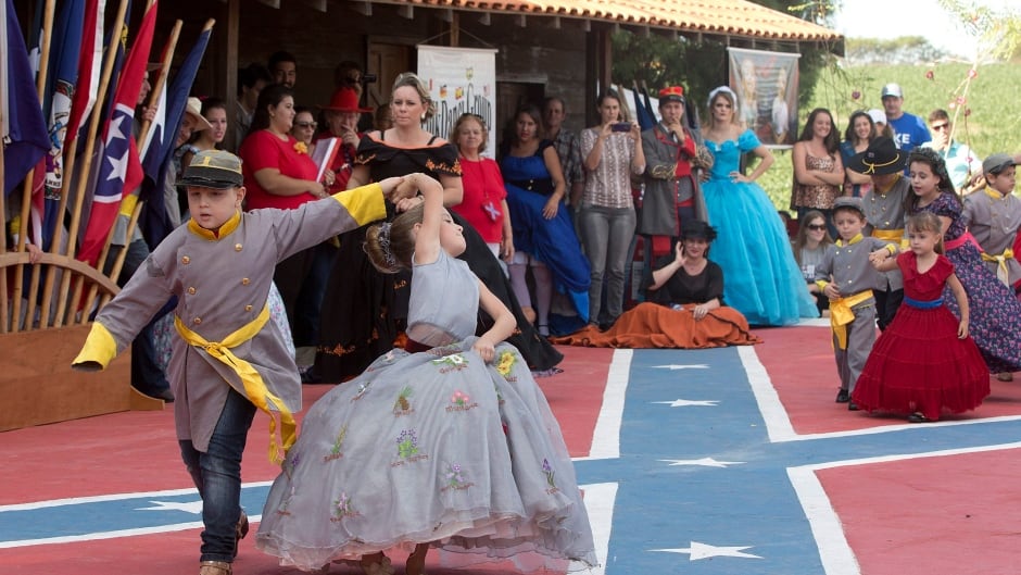 Descendants of American Southerners dance at 'Festa Confederada" in Santa Barbara d'Oeste, Brazil.