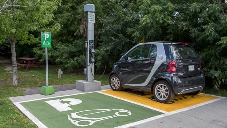 Electric car charging station,car, hybrid, renewable, clean, eco, drive, green, alternative, transport, transportation, plug, fuel, urban, power, recharge, cable, recycle, electric vehicle, vehicle, technology,automobile, energy, battery, car charger, electric, innovation, future,electricity, electric motor,green energy, refueling, electric car, charging, power supply, auto,Toronto, Ontario, CRD Aug 5 2015, (David Donnelly/CBC) electric-car-charging