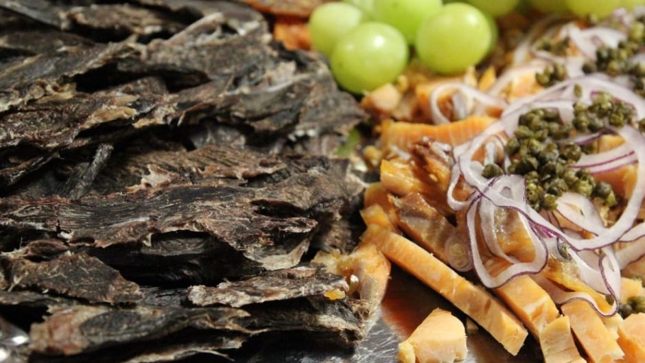 Some Nunavut cuisine: dried caribou and several preparations of dried and smoked arctic char (called ‘pipsi’).