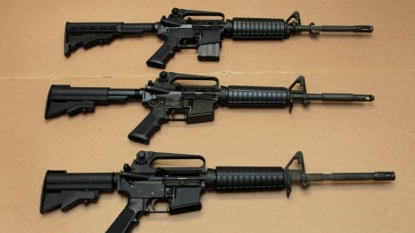 FILE -- In this Aug. 15, 2012 file photo, three variations of the AR-15 assault rifle are displayed at the California Department of Justice in Sacramento, Calif. While the guns look similar, the bottom version is illegal in California because of its quick reload capabilities. Omar Mateen used an AR-15 that he purchased legally when he killed 49 people in an Orlando nightclub over the weekend President Barack Obama and other gun control advocates have repeatedly called for reinstating a federal ban on semi-automatic assault weapons that expired in 2004, but have been thwarted by Republicans in Congress. (AP Photo/Rich Pedroncelli,file) AR-15
