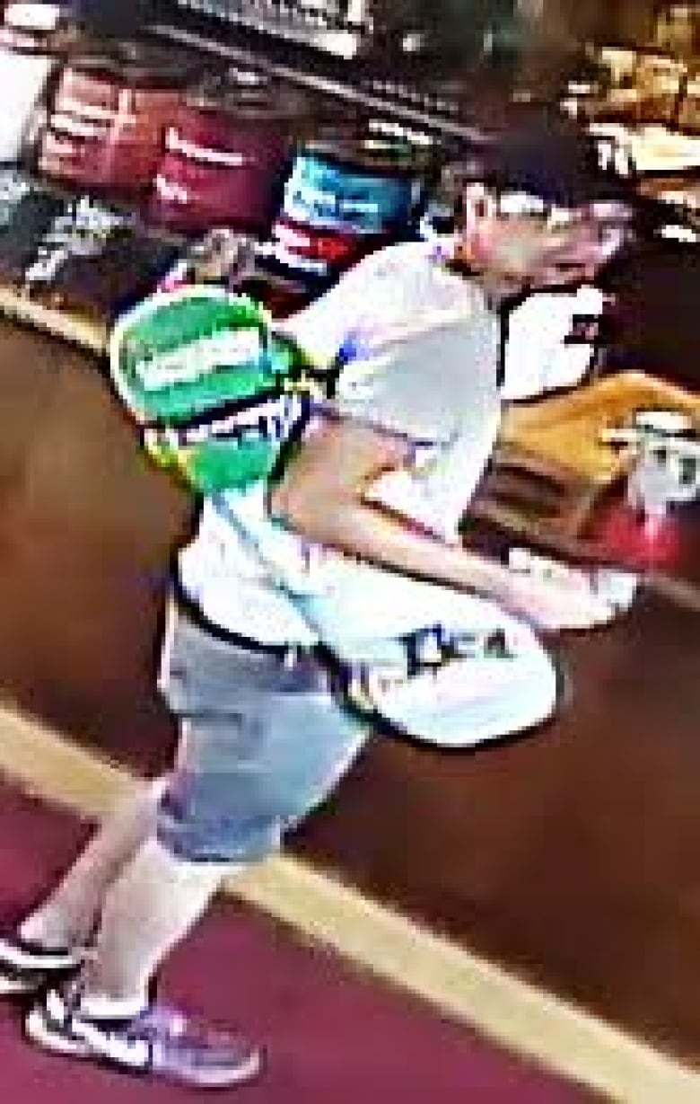 Guelph Police Release Video Of Art Theft From Downtown Cafe Cbc News