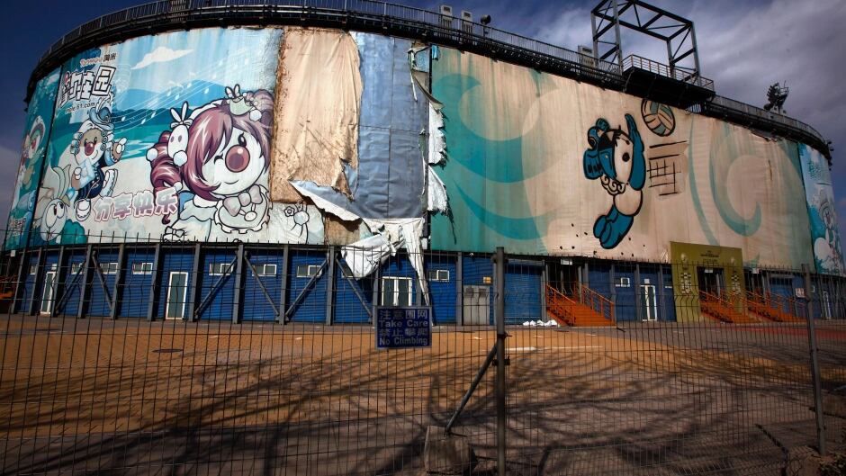 The 2008 Beijing Olympics venue for the beach volleyball competition lies deserted in central Beijing, April 2, 2012. With so many neglected Olympic venues, many argue it's time to consider a permanent location.