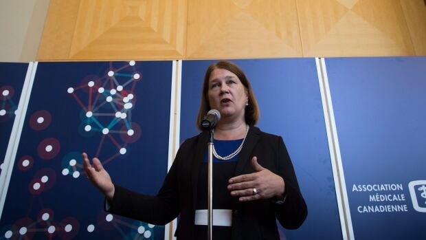 Federal Health Minister Jane Philpott answers questions from reporters after addressing the Canadian Medical Association's General Council 2016, in Vancouver.