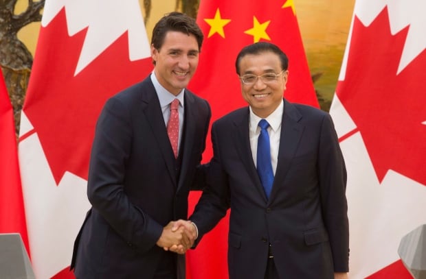 APTOPIX China Canada