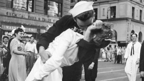 ** FILE ** In this photograph released by the United States Navy, a sailor and nurse embrace in New York's Times Square in a file photo from Aug. 14, 1945. A statue by Seward Johnson commorating the event was released Thursday, Aug. 11, 2005, in New York's Time Square. The 60th anniversary of the event is Sunday, Aug. 14, 2005. TIMES SQUARE KISS