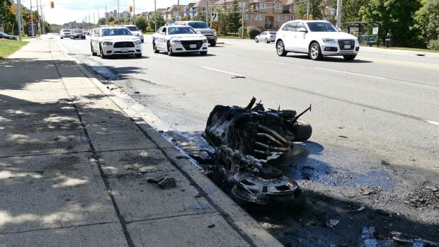 Charred motorcycle Dundas Street