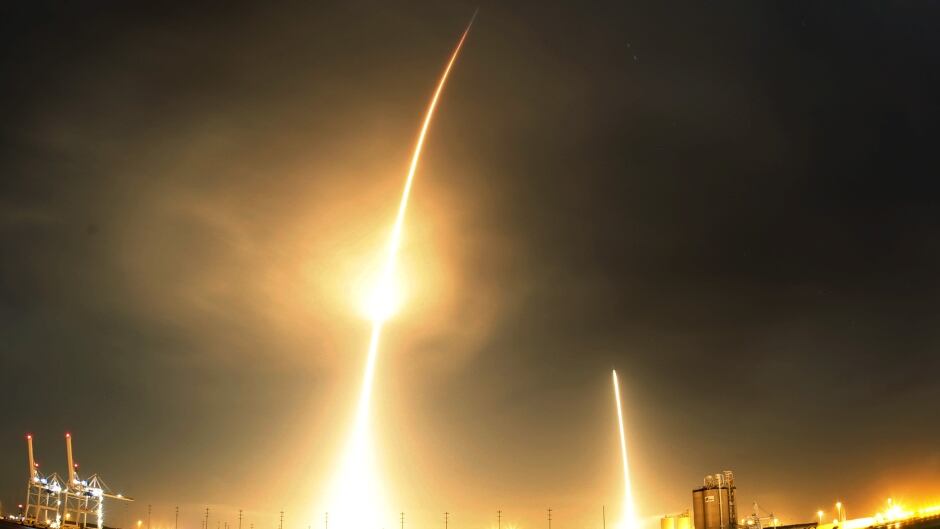 A long exposure photograph shows the SpaceX Falcon 9 lifting off (L) from its launch pad and then returning to a landing zone (R) at the Cape Canaveral Air Force Station, on the launcher's first mission since a June failure, in Cape Canaveral, Florida, December 21, 2015. The rocket carried a payload of eleven satellites owned by Orbcomm, a New Jersey-based communications company. This long exposure photograph was made by covering the lens in between liftoff and landing. (Mike Brown/Reuters)